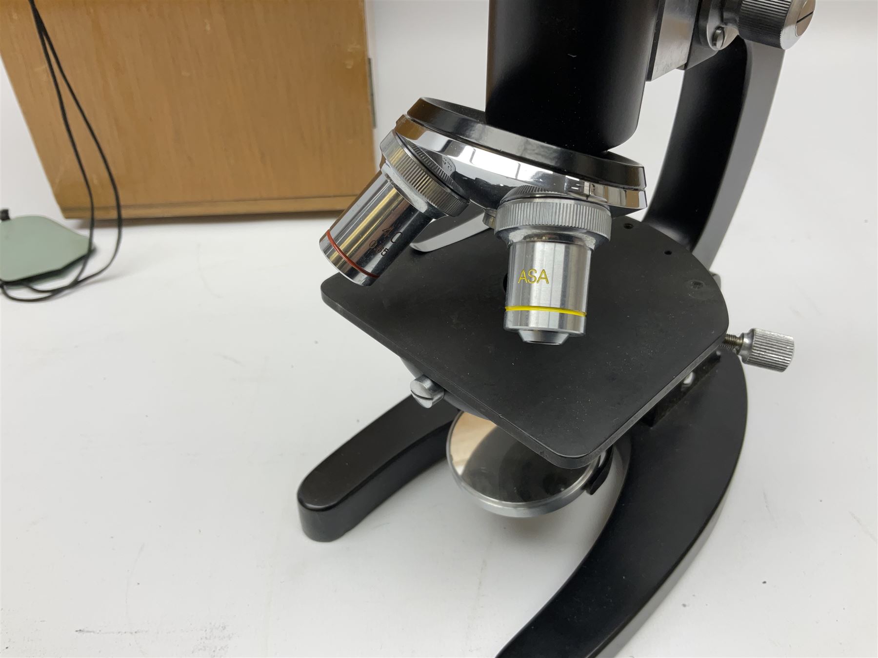 ASA Tokyo monocular microscope with black body, pitchfork base and wooden carrying box containing additional lenses No.47324 H29cm; Universal Avometer Model 8x Mk.III (Panclimatic); and Dansette 222 portable transistor radio (3)
