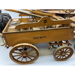 Four Melba Ware Shire horse figures and another similar, and three wood carts