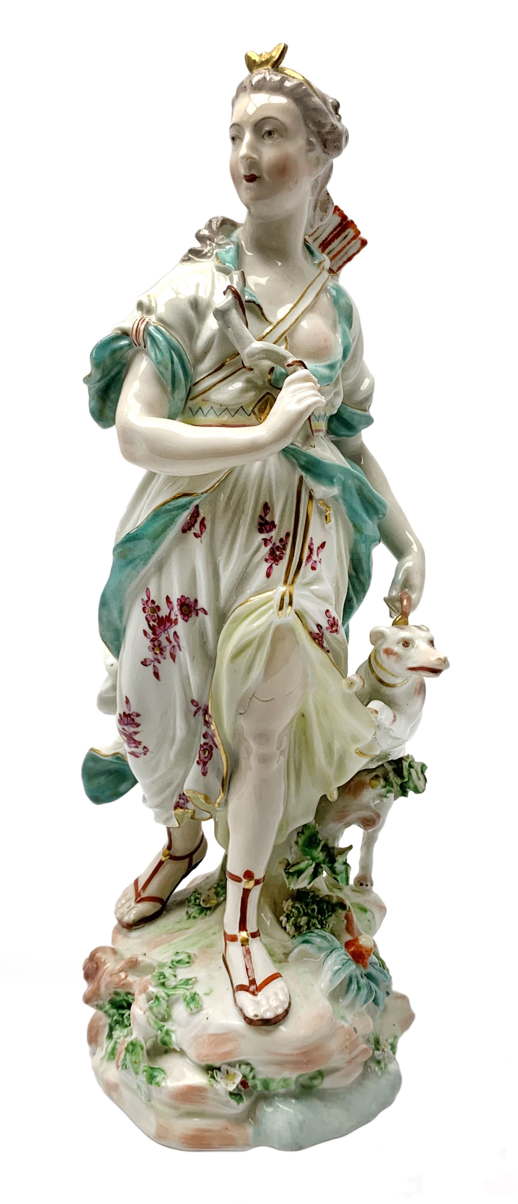 Mid 18th century Derby porcelain figure modelled as Dianna the Huntress, with quiver of arrows upon her back and dog by her side, upon a naturalistically modelled base, with patch marks beneath and collectors labels, H26cm