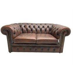 Chesterfield two seat sofa, upholstered in brown buttoned leather