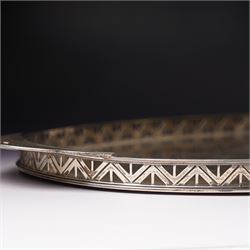 Silver oval tray with pierced rim and flattened handles W47cm Sheffield 1934 Maker Mappin & Webb