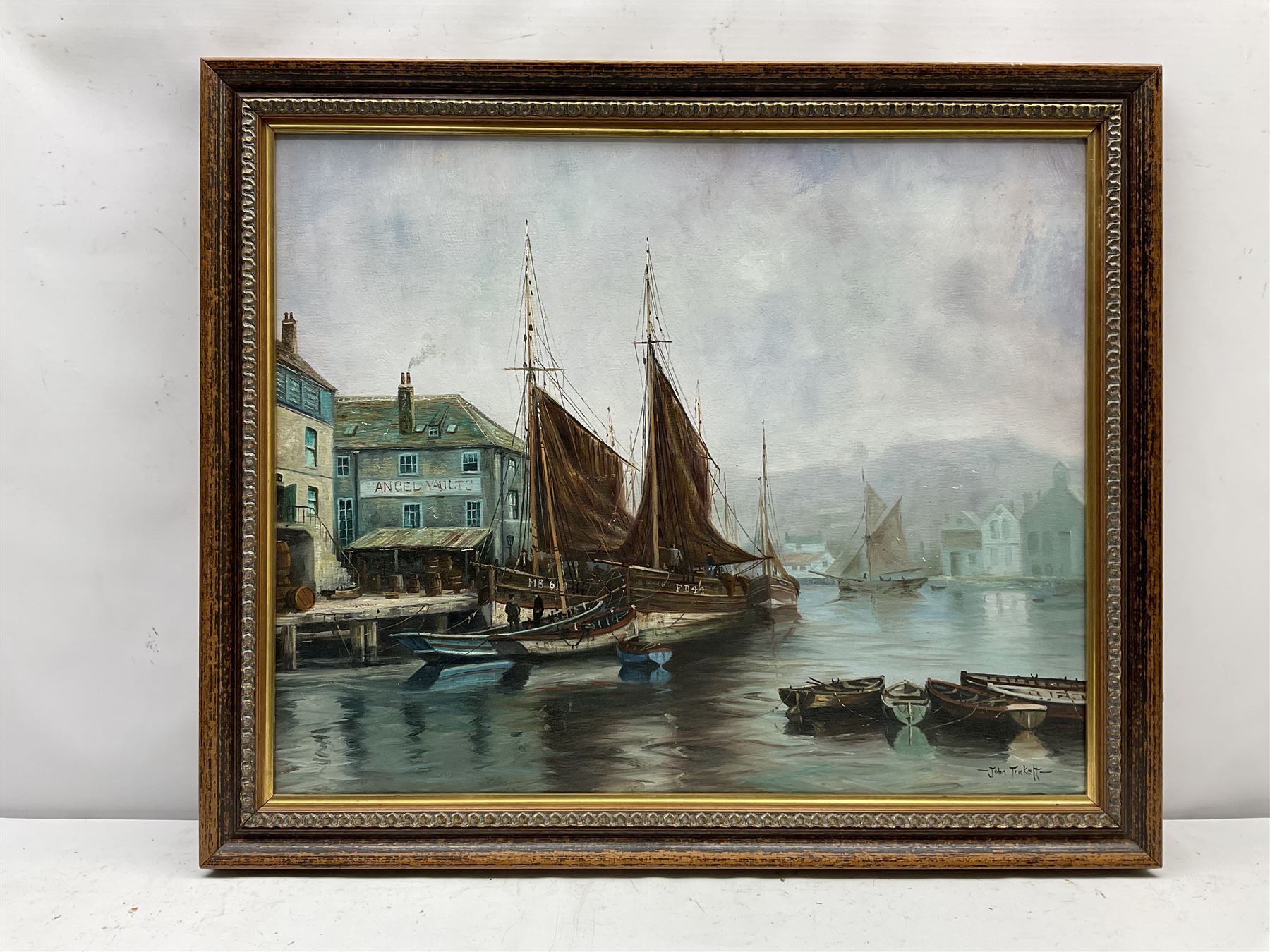 John Trickett (British 1952-): 'Angel Vaults Whitby Harbour,' oil on canvas signed, titled verso 48cm x 59cm