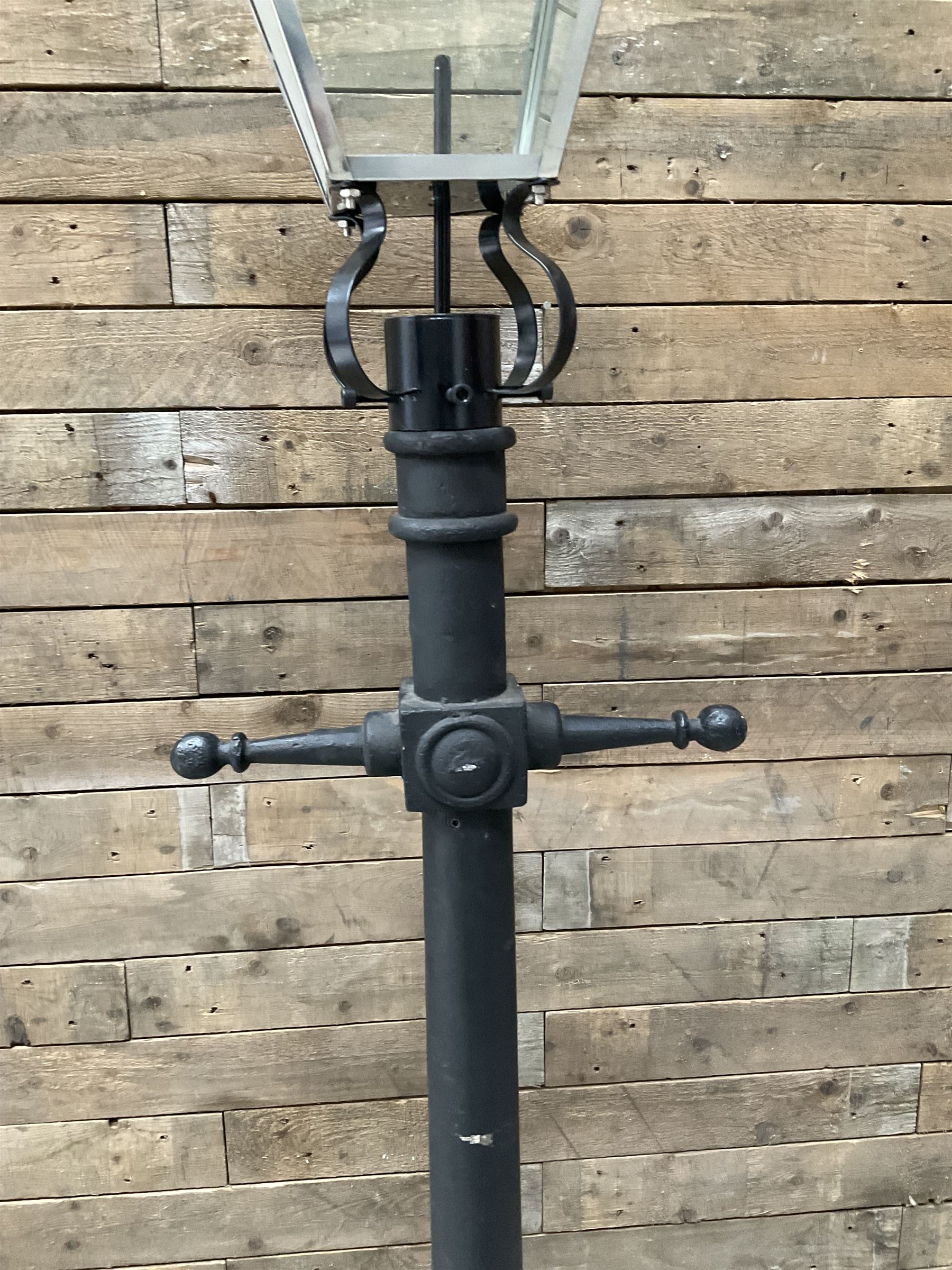Victorian design cast iron street or driveway lamp, in black finish with stainless steel lantern top