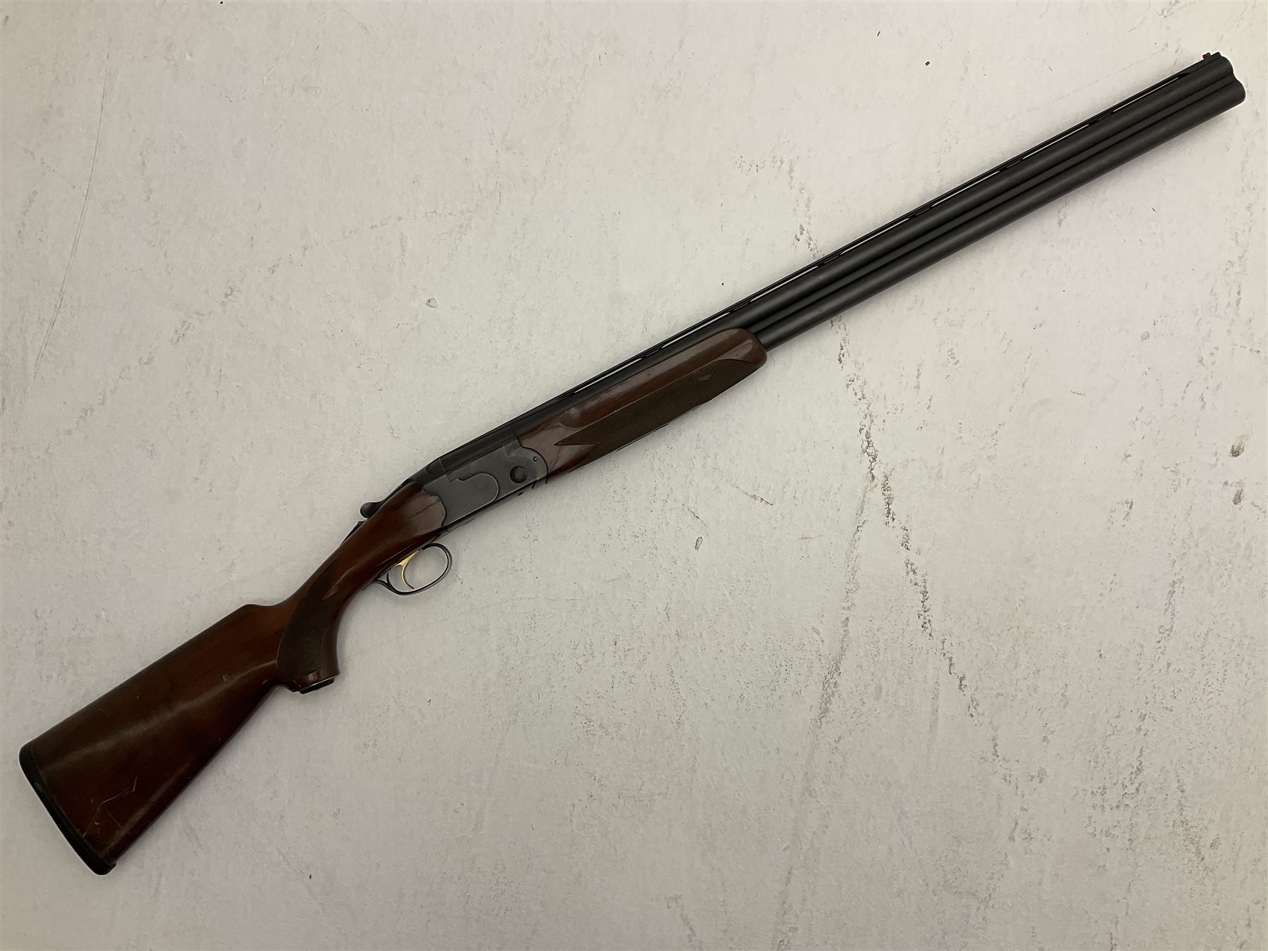 Italian Beretta Model 686 Onyx 12-bore double barrel over-and-under boxlock ejector shotgun, the 74.5cm barrels with ventilated top rib, walnut stock with chequered pistol grip and fore-end, single selective trigger Fore-end no.38044 Barrels no.5314 Action no.F38044B; together with set of five chokes (two fitted) SHOTGUN CERTIFICATE REQUIRED