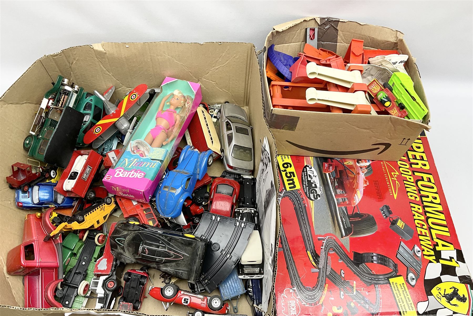 Quantity of die-cast model cars to include Matchbox and Lesley, Franklin Mint Rolls Royce etc, boxed Ferrari Super Formula 1 Michael Schumacher Collection looping raceway, other toys etc