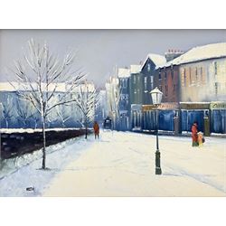Barry Hilton (British 1941-): Snowy Winter Street Scene, oil on canvas signed 29cm x 39cm