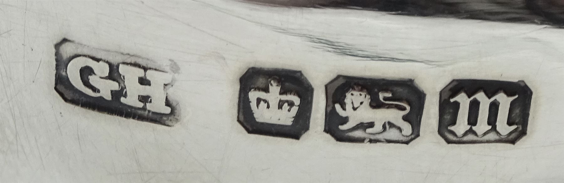 Silver milk jug and sugar bowl by Robert Pringle & Sons, London 1919 and a silver sauce boat by Sheffield Harrison Brothers & Howson, Sheffield 1904, approx 7.7oz