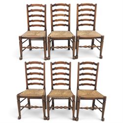 19th century set of six ash and elm ladderback dining chairs, shaped ladder backs above ru...