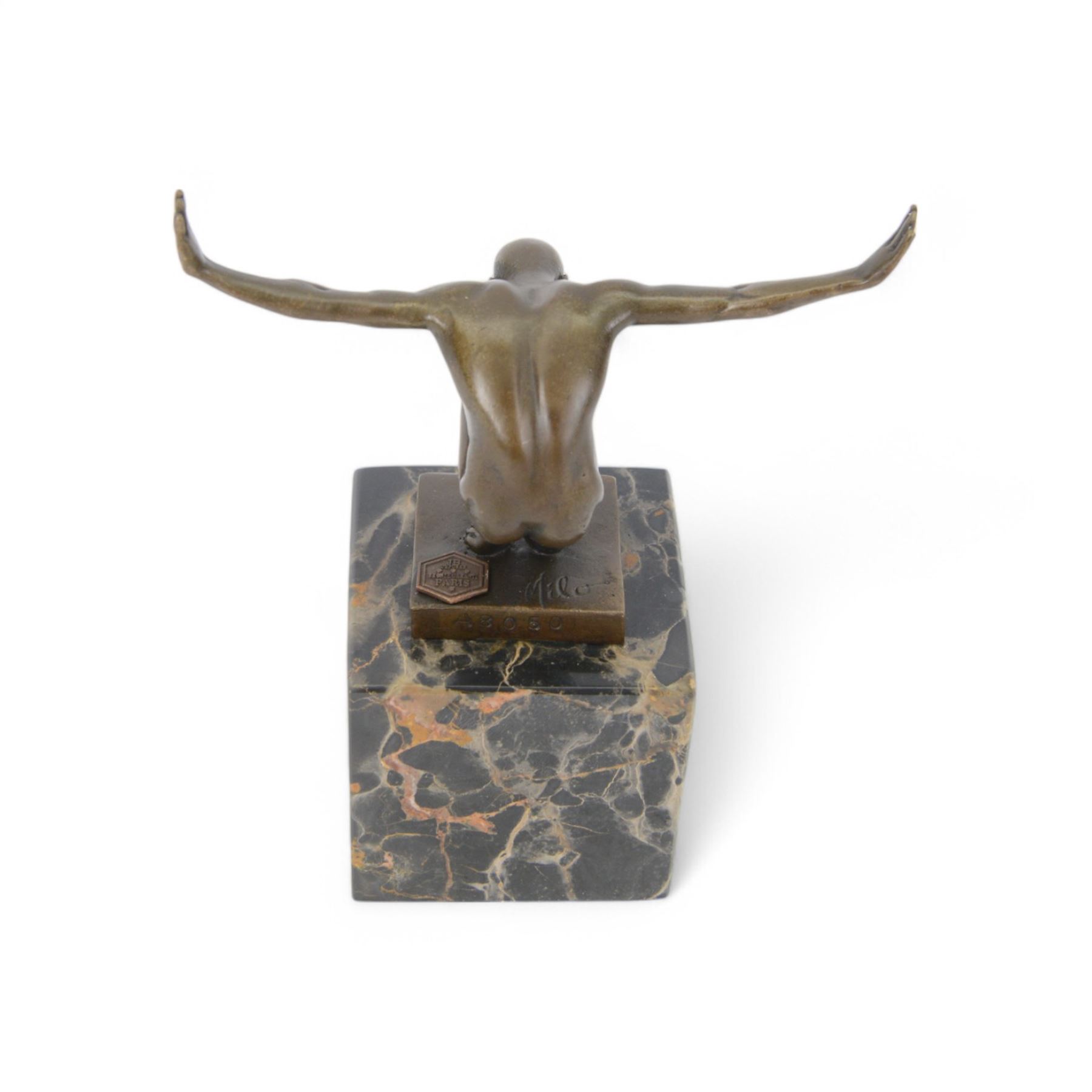Bronze figure after Milo, a 'Power Of Silence', modelled as a male athlete crouched with arms outstretched upon a marble plinth, signed Milo, H15cm