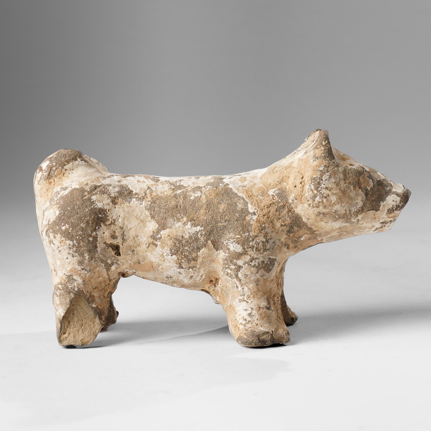 Chinese figure of a dog, probably Han Dynasty, W18cm