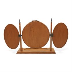 And So To Bed - 'Louis XV' triple dressing table mirror, central circular bevelled mirror, enclosed by parcel gilt with carved edge, flanked by two oval mirrors, the base with a well for trinkets 