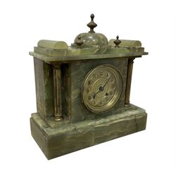 French-early 20th century 8-day onyx mantle clock with a gilt metal dial and rack striking movement.