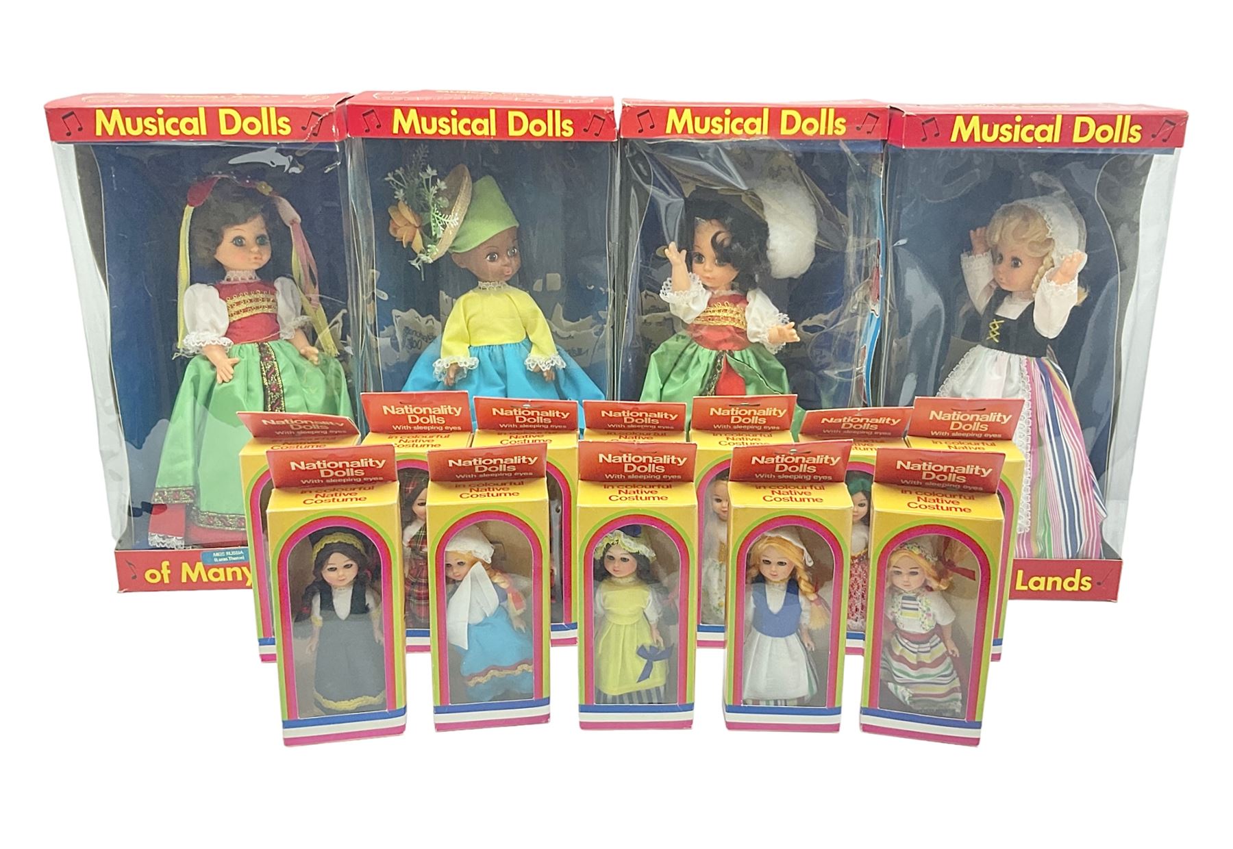 Four Mayfair Products Musical Dolls of Many Lands; original boxes and delivery boxes; and set of twelve Nationality Dolls with Sleeping Eyes; boxed (16)