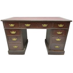 Late Victorian mahogany twin pedestal desk, moulded rectangular top with inset writing surface, fitted with nine drawers, moulded uprights, on moulded plinth base