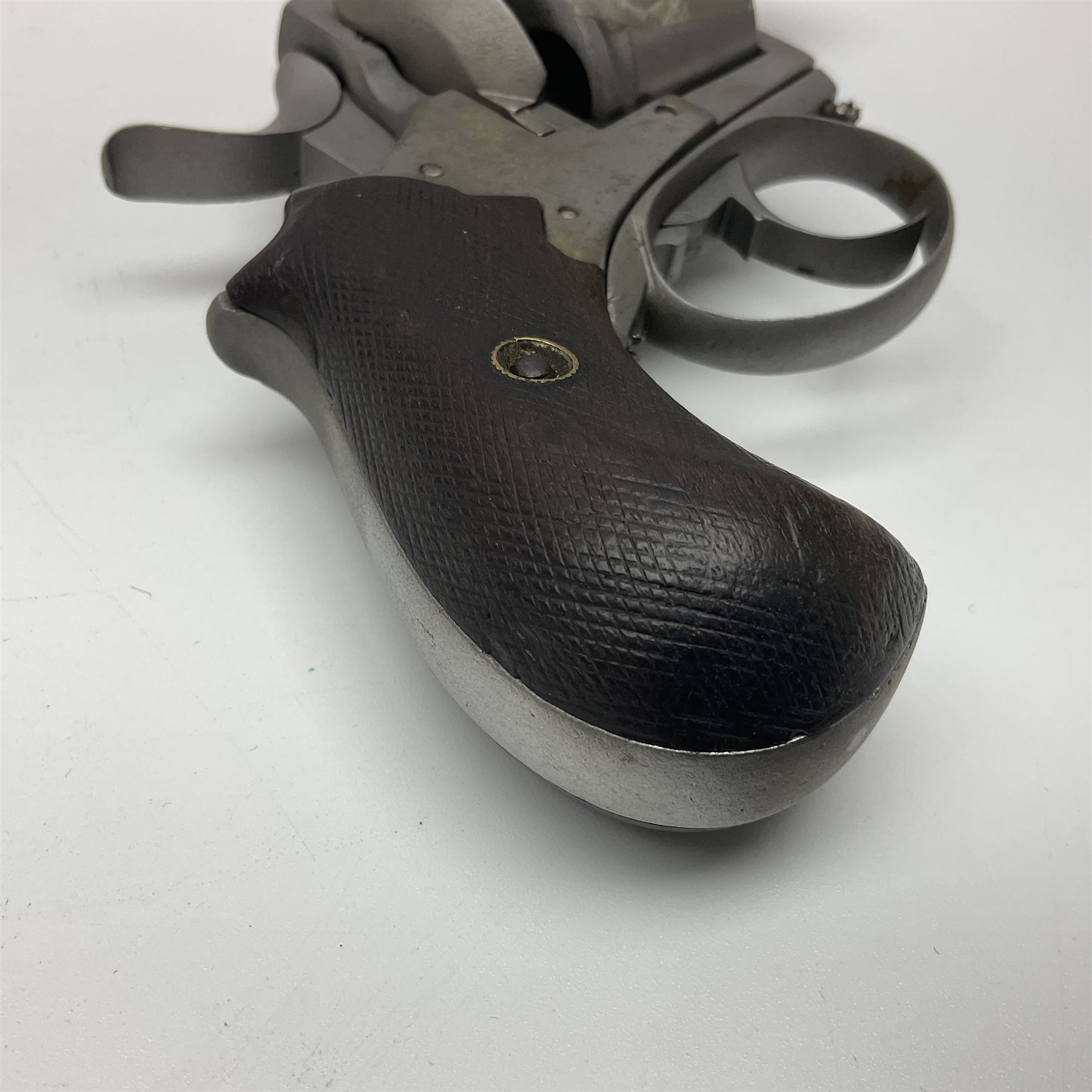 The major parts only of a British Bull-Dog .500 Boxer five-shot revolver comprising stripped down framework, cylinder, trigger with guard, functioning hammer and two-piece chequered grip; retailed by G. Goth Buenos Ayres; Belgian proof marks; L19.5cm overall; in fitted mahogany case 