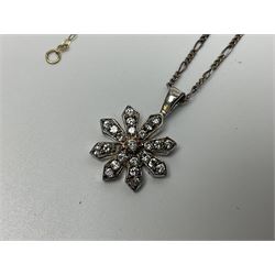 9ct gold necklace, stamped 9K, silver cubic zirconia flower cluster pendant necklace, stamped 925 and a collection of costume jewellery in a musical box