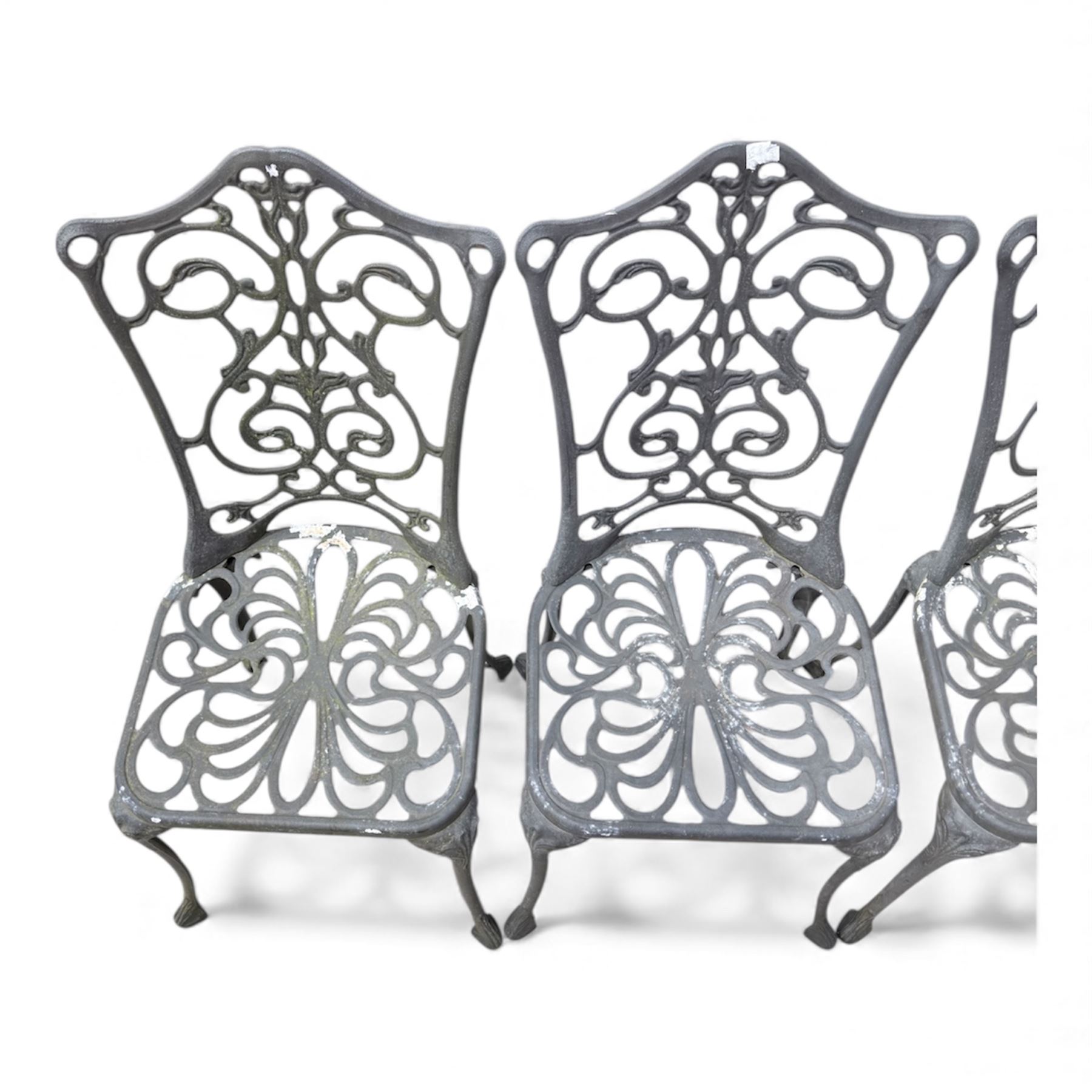 Cast aluminium garden table and four chairs in dark grey