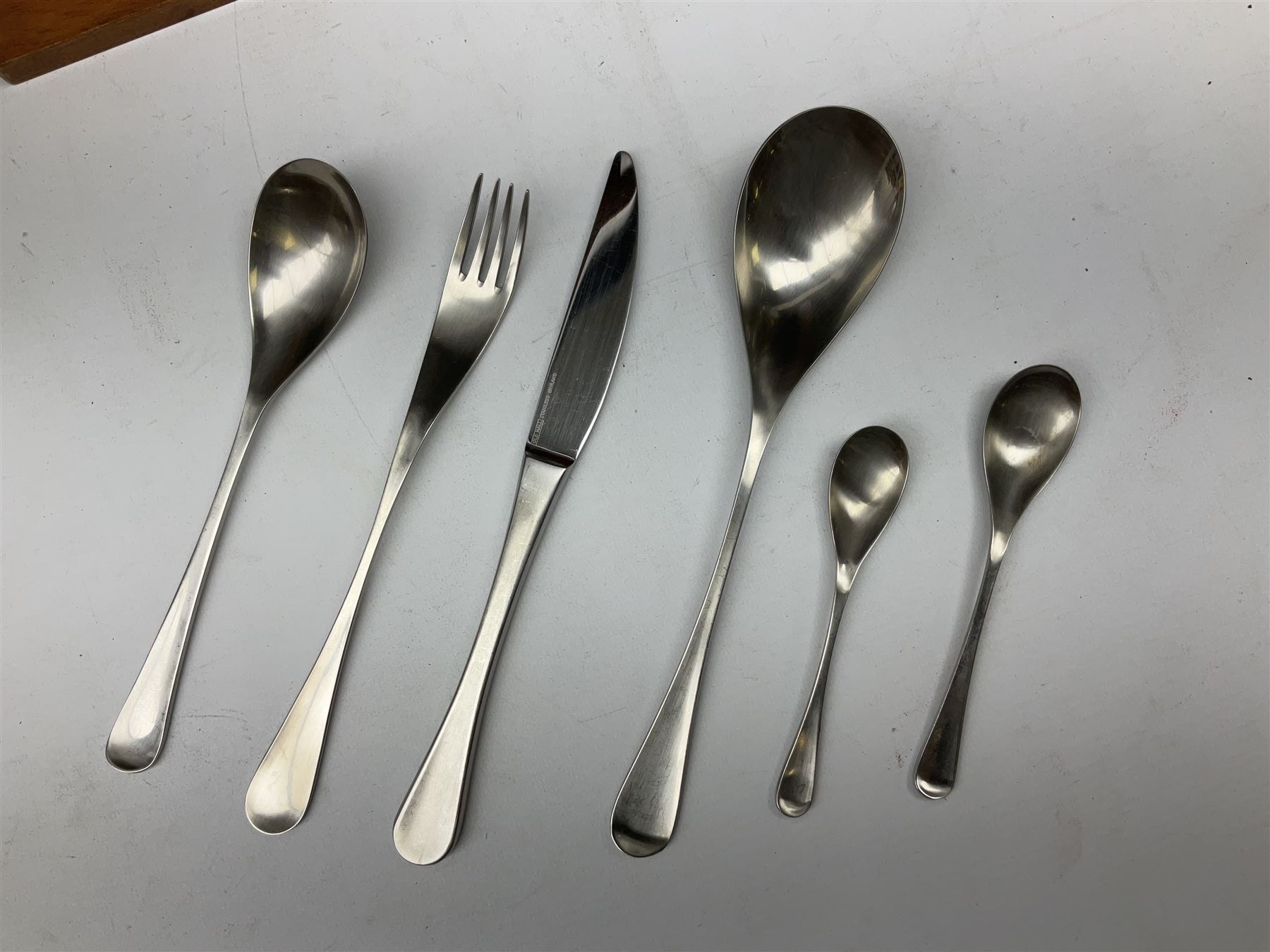 Old Hall Alveston pattern cased canteen, designed by Robert Welch, setting for eight, comprising dinner forks, dinner knives, dessert forks, dessert knives, tea spoons, coffee spoons, soup spoons, dessert spoons, pair of serving spoons and pair of smaller serving spoons