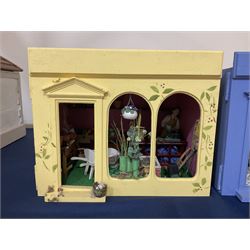 Three scratch-built wooden shop dioramas - single room Pet Shop with hinged front, fully furnished and well stocked with animals, birds and numerous accessories; and matching Garden Shop, fully furnished and well stocked with fruit, vegetables and garden accessories including lawn mower, wheelbarrows etc; each W34cm H27cm D26cm; and double fronted single room Butchers Shop with butcher at his block, partially stocked counter and two delivery cycles W57cm (3)