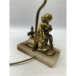 Gilt metal and onyx mounted table lamp, cast as a putti figure, H54cm