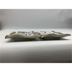 Two Fornasetti rectangular operatic posters ashtrays 'Norma' and 'Iris' decorated with black and white text with a gilt border edge, with printed mark beneath, H16cm