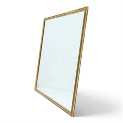 Contemporary giltwood wall mirror, of rectangular form with moulded frame