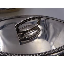 Pair of 1930s silver serving dishes with covers, each with removable handles, hallmarked Barker Brothers Silver Ltd, Birmingham 1935, L27.5cm, H12cm