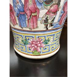 Large pair of 19th century Cantonese famille rose vases, each painted with various courtly scenes, including a display of warriors fighting on horseback before an official and his attendants, double Buddhist lion handles and applied at the shoulders with chilong, the lower band painted with Greek key motif, H58cm (2)