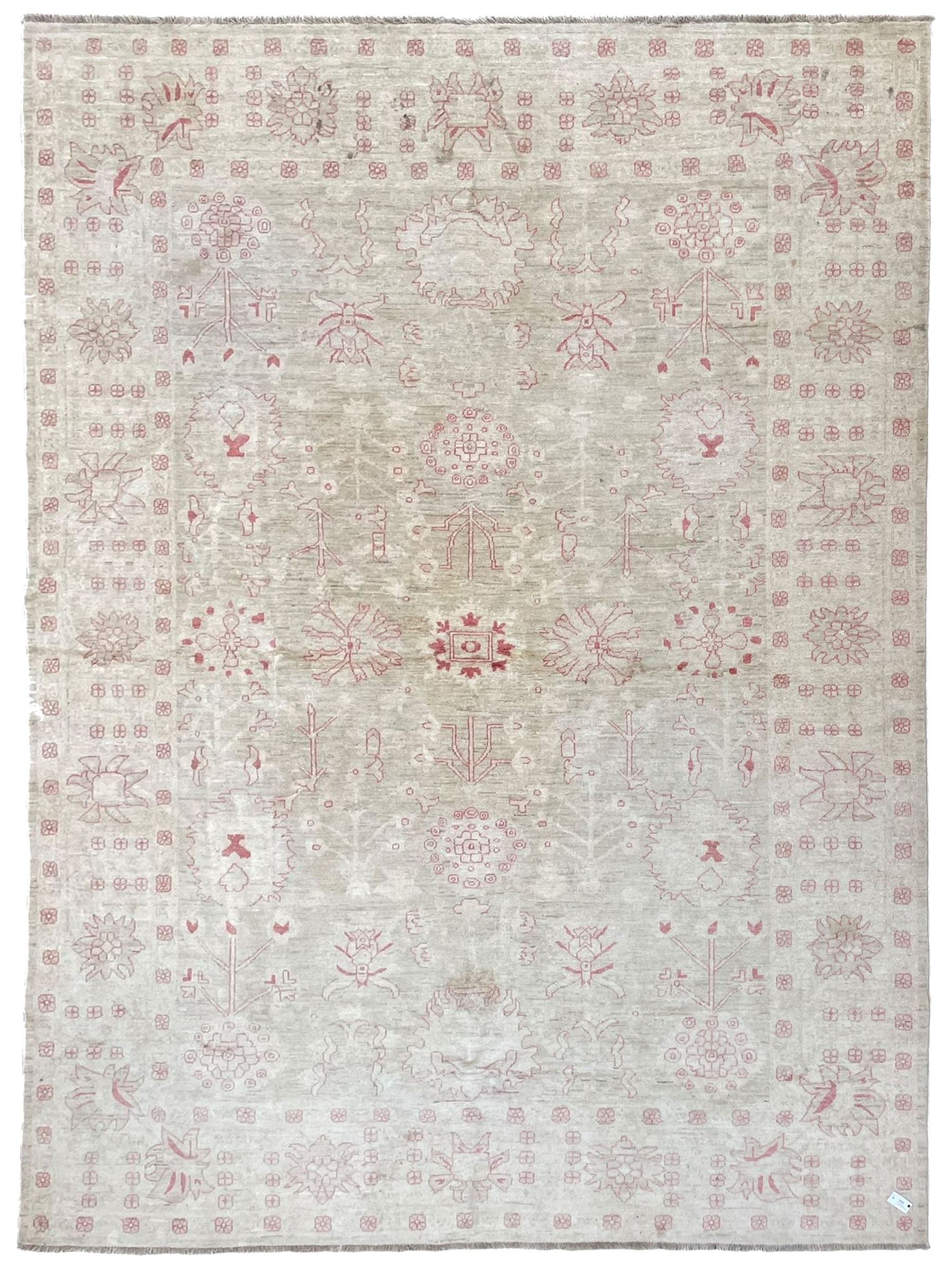 Persian design pale ivory ground carpet, decorated with stylised plant and leaf motifs in pale red