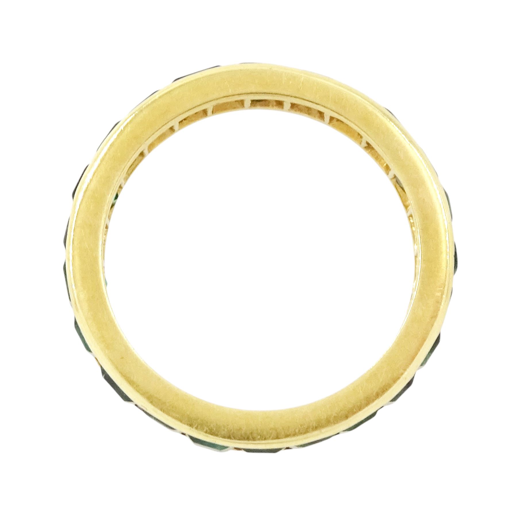 18ct gold emerald full eternity ring, channel set with calibre cut emeralds