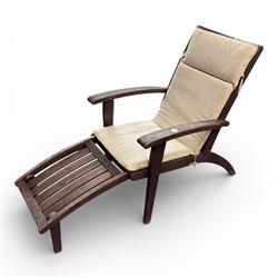 Two teak steamer chairs, one with cushion