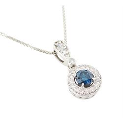 14ct white gold diamond pendant necklace, single round brilliant cut fancy blue diamond of approx 0.45 carat, surrounded by a halo of milgrain set round brilliant cut diamonds, to a diamond set bail, on a wheat link chain necklace, total white diamond weight approx 0.25 carat