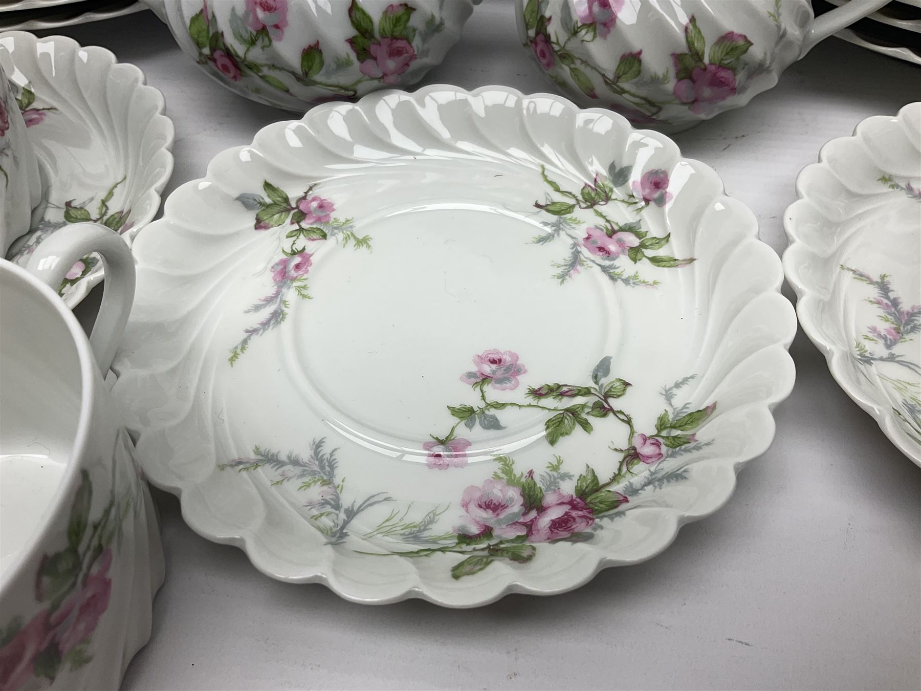 Limoges Haviland pattern coffee service for eight, comprising coffee pot, covered sucrier, milk jug, dessert plates, cups and saucers (27)