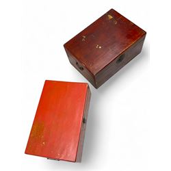 Pair of Chinese 18th century hand-painted leather-bound wooden trunks, each adorned with metal locks, twin carrying handles and patterned fabric-lined interior