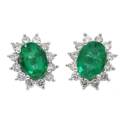  Pair of white gold emerald and diamond cluster stud earrings, hallmarked 18ct   