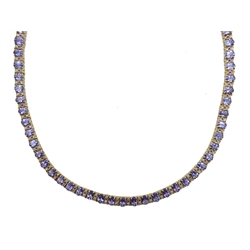  Gold tanzanite and diamond necklace stamped 14K 585, tanzanite total weight 32 carat  