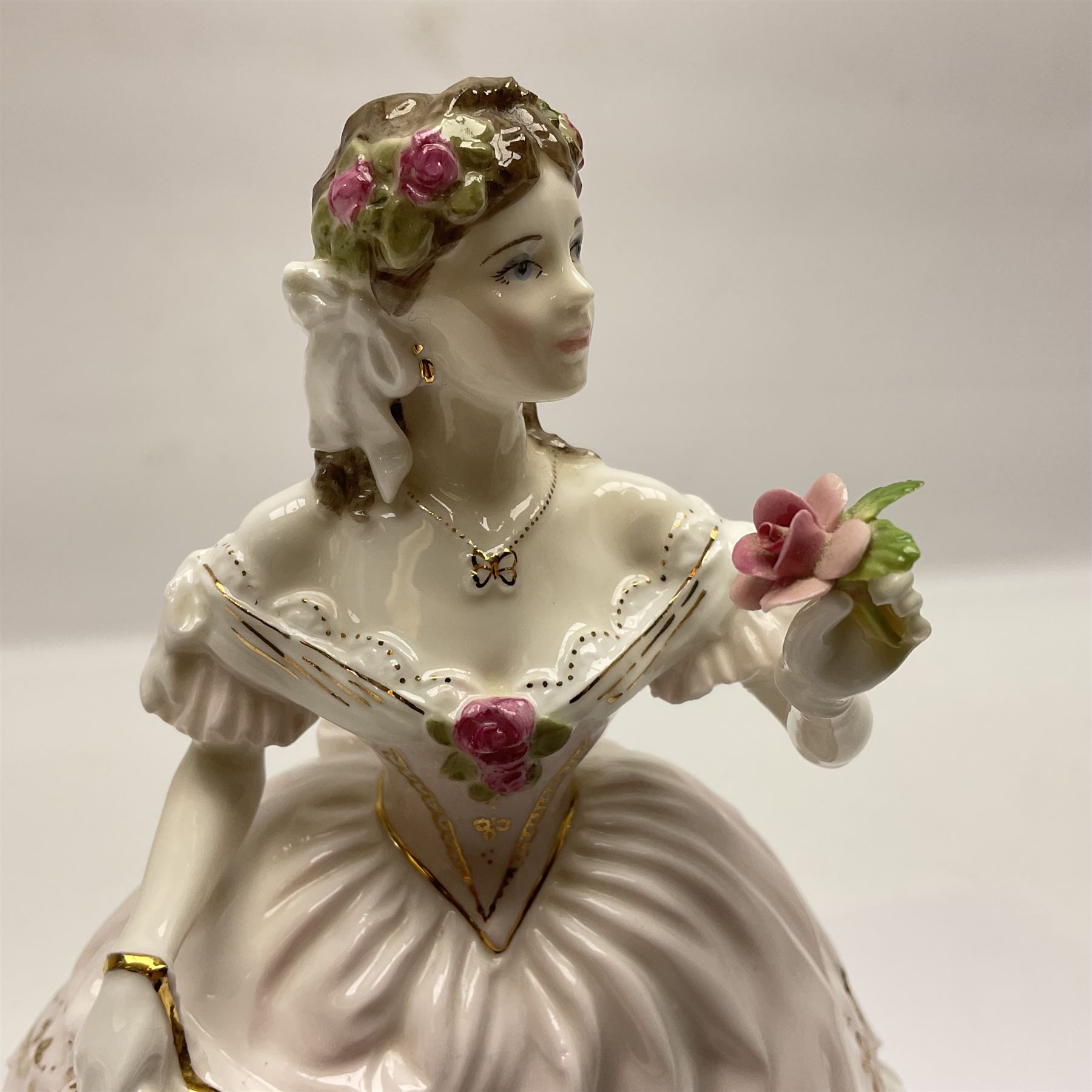 Three Royal Worcester figurines,  The First Quadrille, The Fairest Rose and Queen of Hearts, largest H21cm