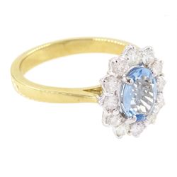 18ct gold aquamarine and diamond cluster ring, oval cut aquamarine of approx 0.80 carat, with round brilliant cut diamond surround, London 2022, total diamond weight approx 0.55 carat
