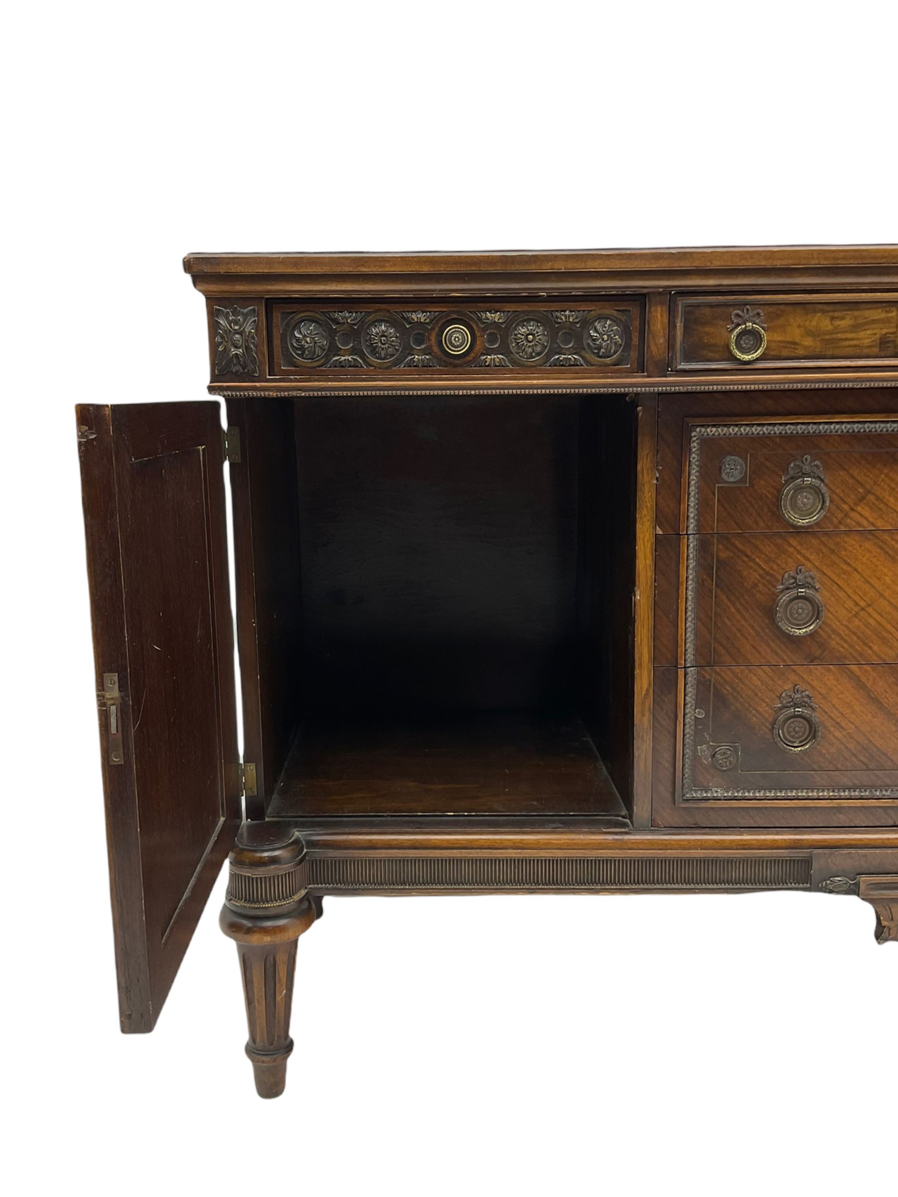 Early 20th century French walnut sideboard, fitted with six drawers and two cupboards