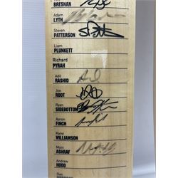 Two signed Yorkshire County cricket bats, from 2013 and 2014 seasons, bearing signatures including Johnny Bairstow, Joe Root, Tim Bresnan, Andrew Gale, etc