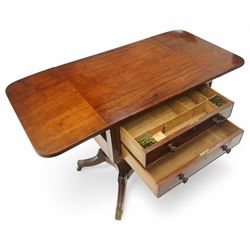 Georgian style mahogany drop leaf work table, rectangular top with rounded drop leaves over two frieze drawers with turned handles, raised on turned pedestal support with four outswept legs terminating in brass caps and castors