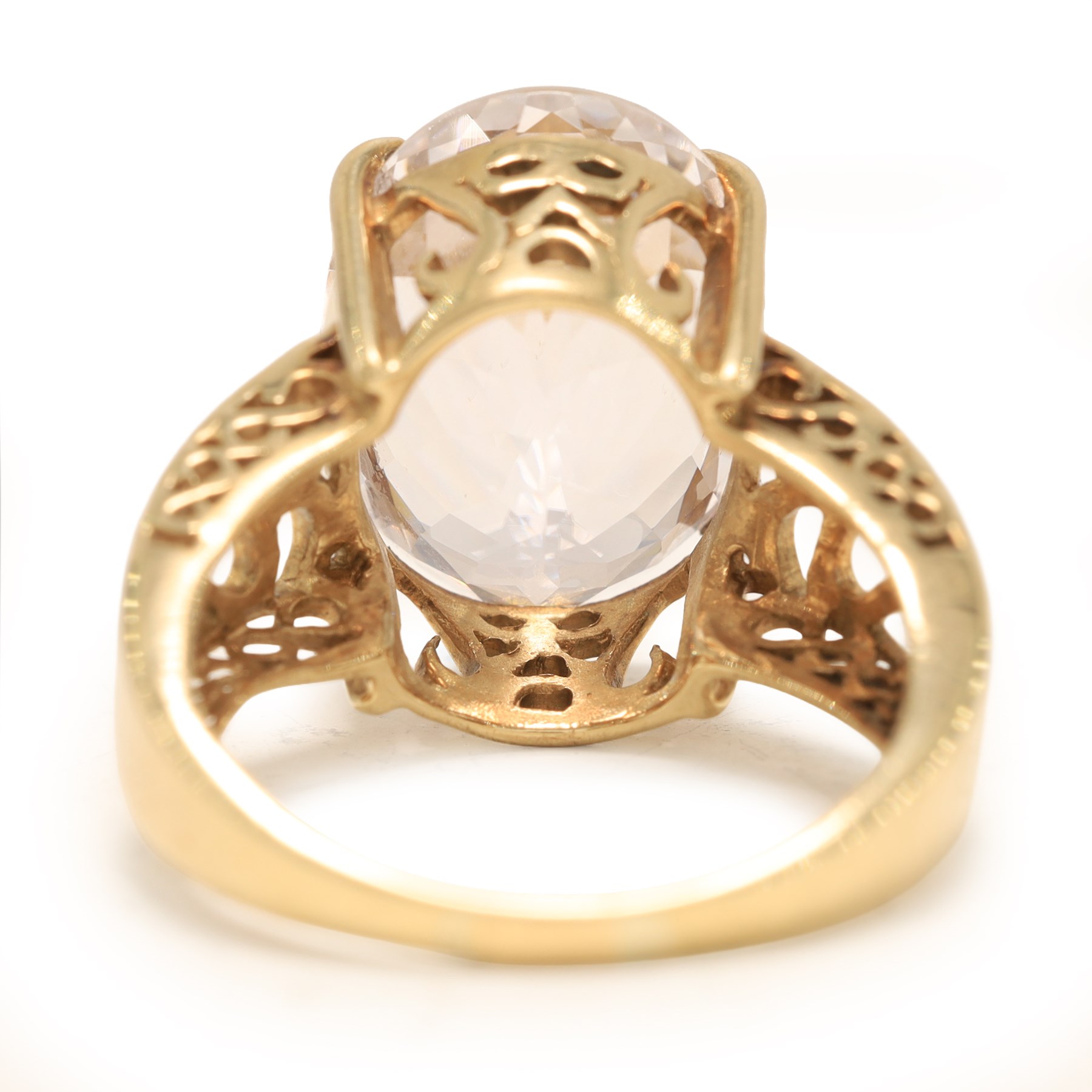 9ct gold kunzite ring, four claw set with a single oval cut kunzite, pierced design gallery and shoulders