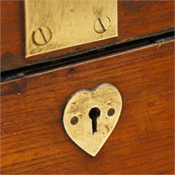 Early 19th century teak and brass bound silver campaign chest, fitted with brass L-shaped brackets and heavy weight carrying handles, the hinged lid enclosing two removeable trays with divisions and lined in blue baize, fitted with two 'R. Cooper & Son' brass locks