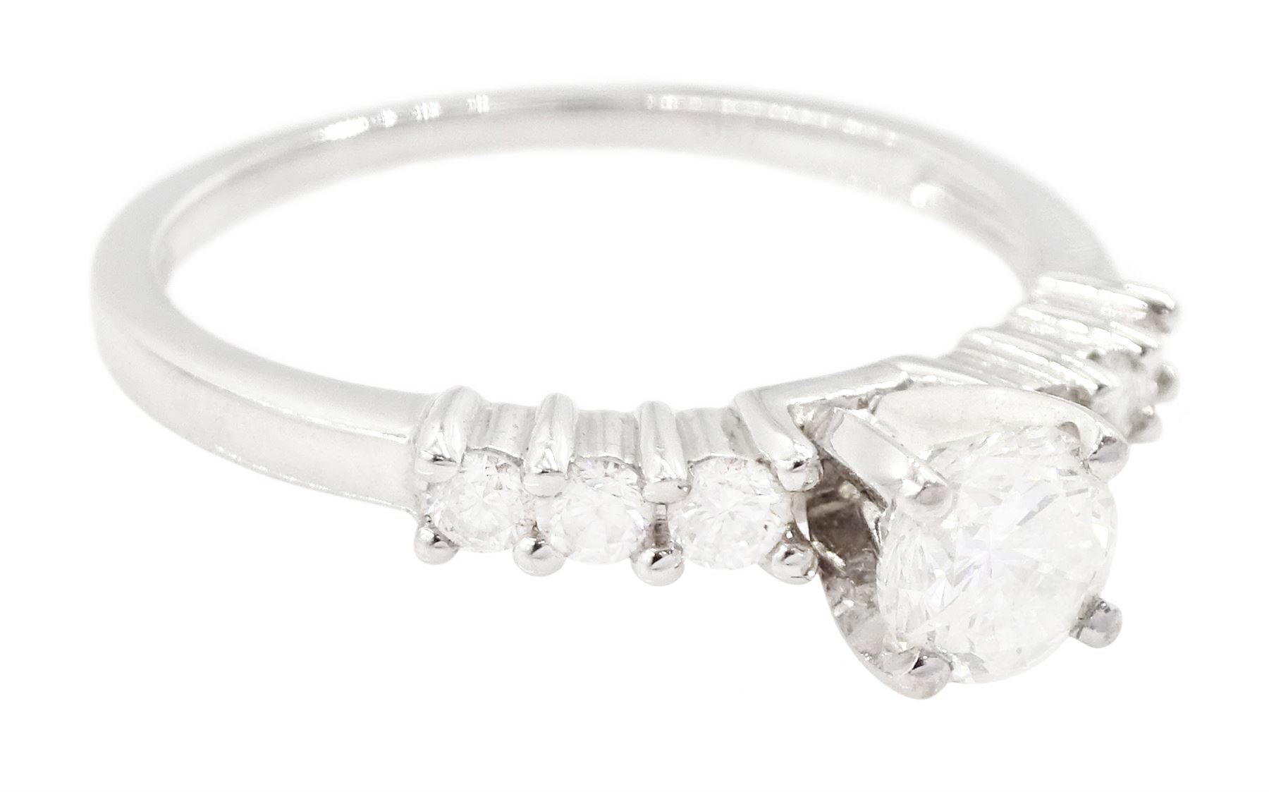 18ct white gold diamond ring, single stone round brilliant cut diamond of approx 0.50 carat, with diamond set shoulders, stamped 750