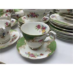 Paragon Rockingham pattern part tea and dinner service including three teapots, milk jug, cups and saucers of various sizes, ten soup bowls, ten side plates, ten dinner plates etc (96)