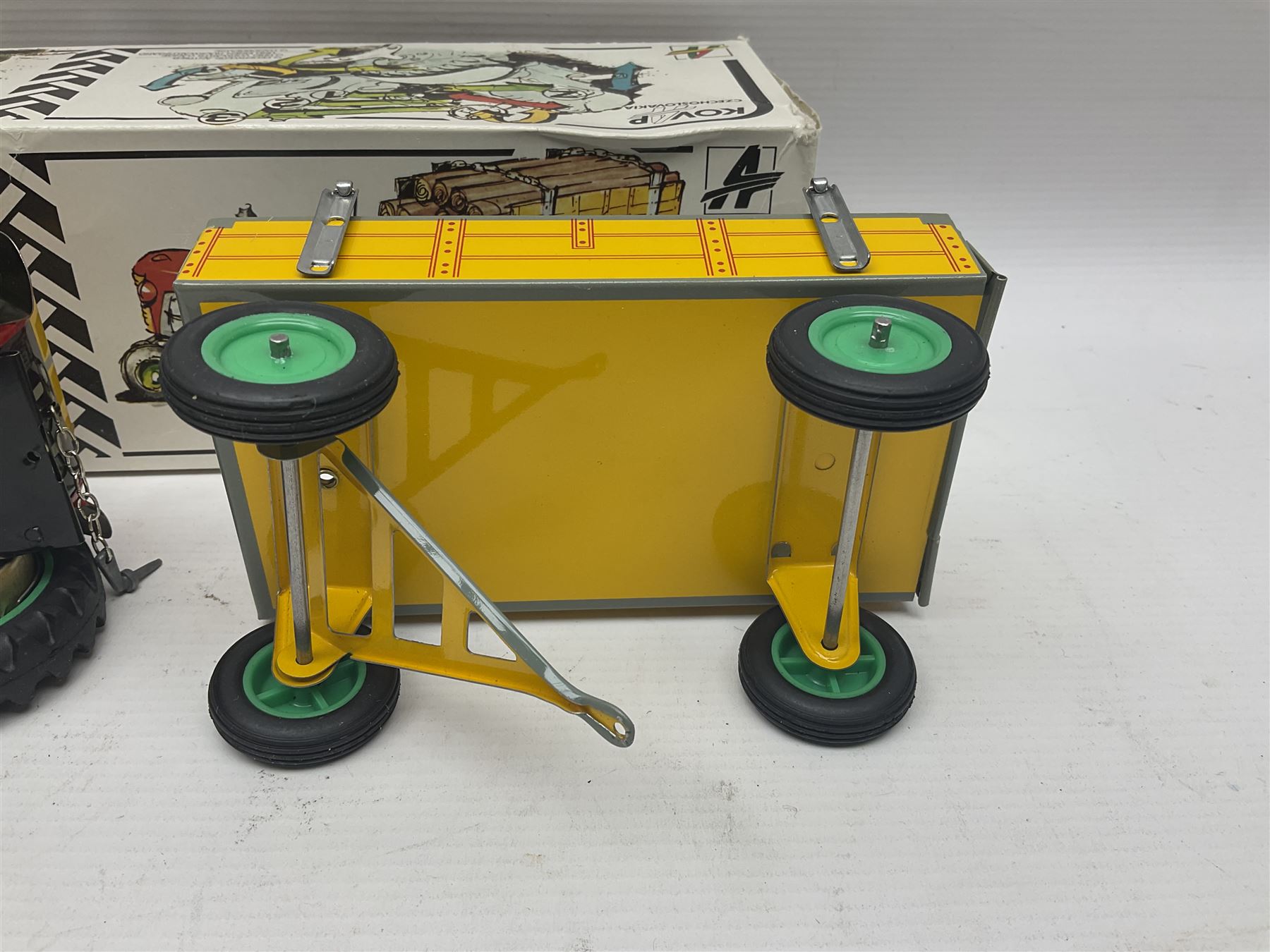 Kovap - eleven tinplate models to include Tractor and Trailer, Road Roller 1927, Moving Moneybox 1924, Hawkeye type B 1924, Boy on a Tricycle; all in original boxes 