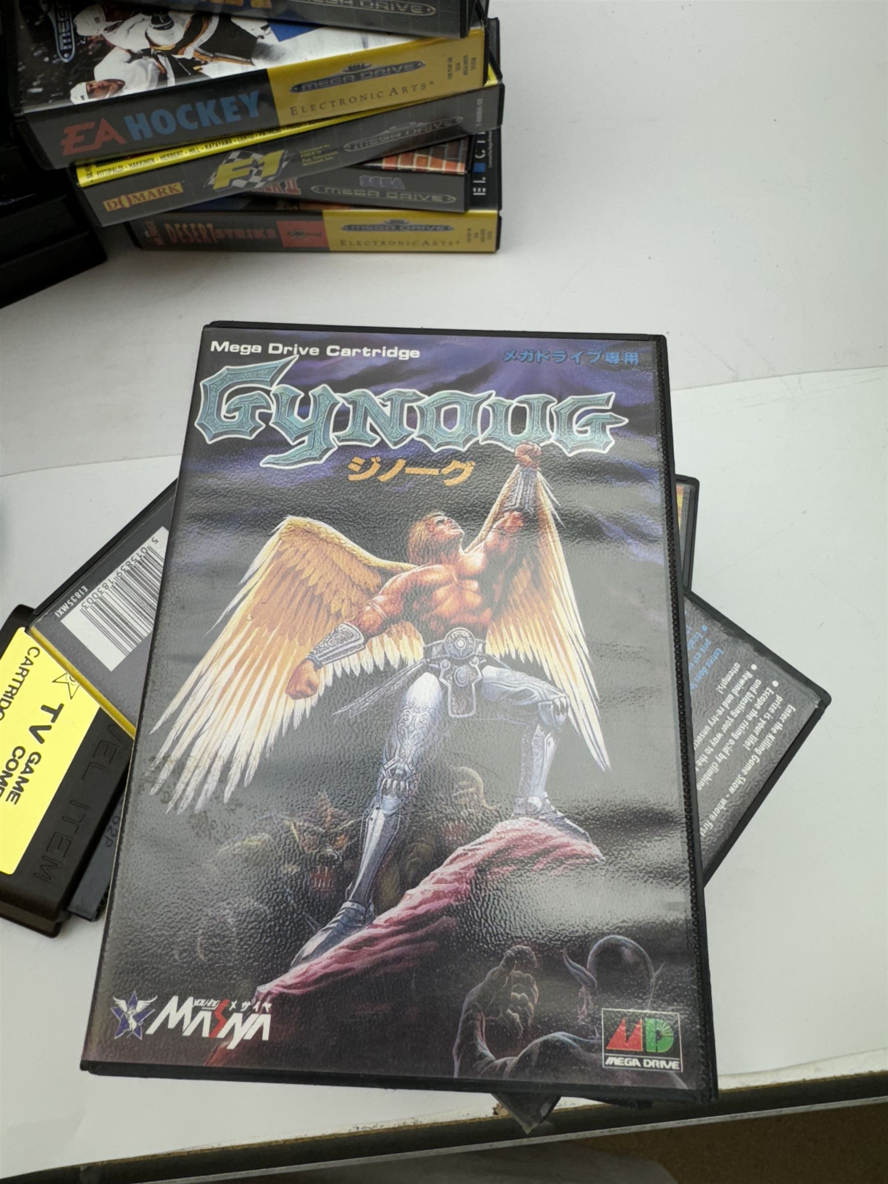 Eighteen Sega Mega Drive games, including Sonic The Hedgehog, Sonic The Hedgehog 2, Alienstorm, Desert Strike, Fatal Rewind, Road Rash etc, all boxed, together with a Sega Mega Drive controller, cartridge converter and an arcade power stick controller