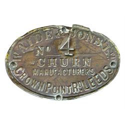 19th century oak and cast iron rotary butter churn, with coopered barrel body, domed lid with filler opening and cast iron securing arms, on tilting iron-mounted frame with crank handle and support rails