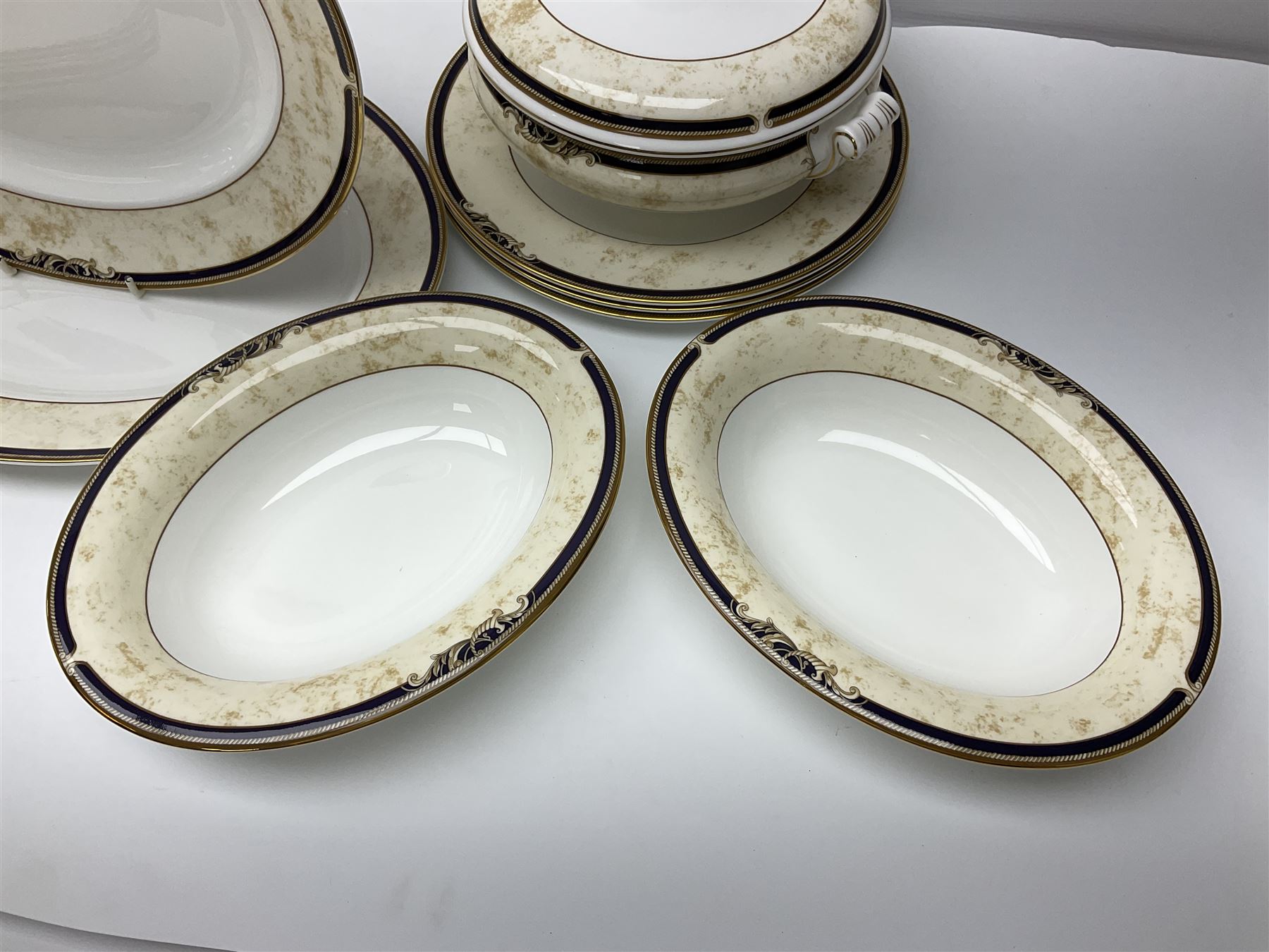 Wedgwood Cornucopia part dinner service, comprising six dinner plates, six soup bowls, six bowls, two serving platters, two oval dishes, covered serving dish, sauce boat and saucer (25)