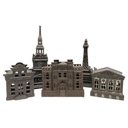 Five early 20th century cast-iron money banks as buildings - 'City Bank' c1904 H10cm; 'County Bank' c1905 H11cm; 'Town Hall Bank' c1900 H8.5cm; 'Tower Bank' c1902 H23.5cm; all made by John Harper; and 'Blackpool Tower Bank' c1907 by Chamberlain & Hill H18.5cm (5)
